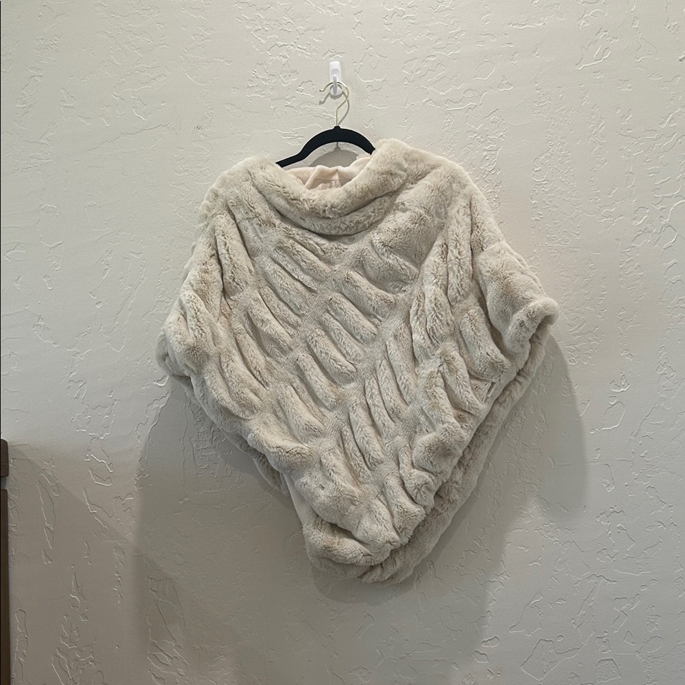 Fabulous Furs -Beautiful Cream Colored Poncho for those cold nights.